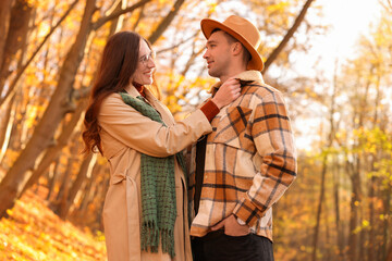 Fototapeta premium Happy couple spending time together in autumn park