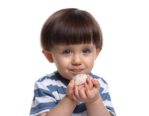 Naklejka premium Cute little child eating tasty mochi on white background