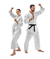 Karate fighters in uniform on white background