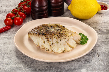 Baked cod fish fillet with spices