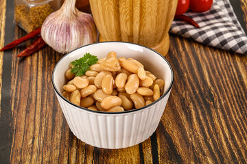 Baked white canned beans in the bowl