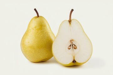 Two pears, one whole and one sliced in half, on a white background.