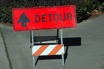 Temporary DETOUR sign with arrow pointing up