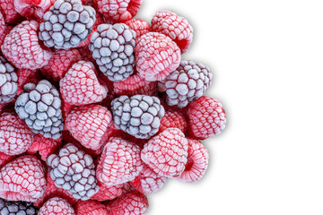 frozen raspberries and blackberries covered with white ice on white background, free space