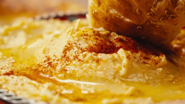 Hummus close-up, middle eastern national traditional food. Muslim family dinner, Ramadan, iftar. Arabian cuisine delivery. 