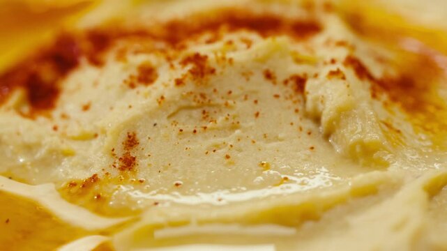 Hummus close-up, middle eastern national traditional food. Muslim family dinner, Ramadan, iftar. Arabian cuisine delivery. 