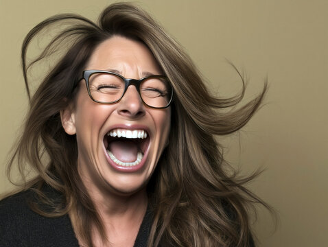 female portrait: laughing uproariously