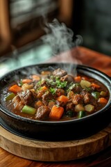 A bowl of stew with meat and vegetables is steaming. The dish is served on a wooden table