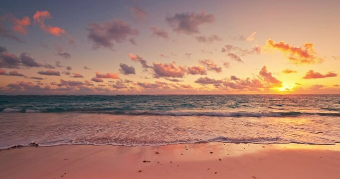 Ocean beach sunrise with beautiful clouds over the sea waves and tropical island shore, paradise exotic nature, landscape summer travel caribbean vacation
