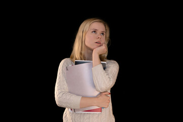 Thoughtful And Bored Girl Holding Notebooks on Black Background