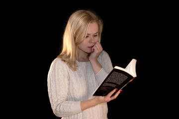 Focused Woman Reading a Book in Thoughtful Mood