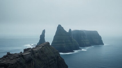 Majestic Sea Stacks in Morning Fog