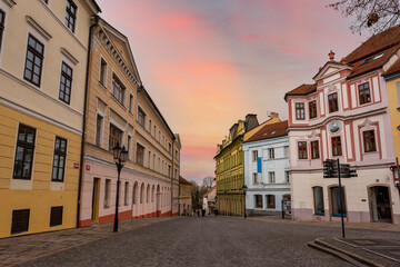 Narrow picturesque street with baroque and renaissance historical buildings. Cityscape of medieval...
