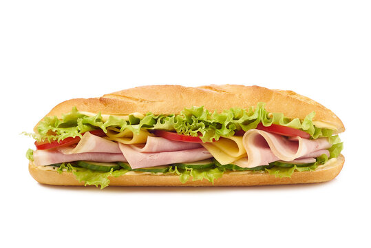 Delicious baguette sandwich with slices of ham, cheese, lettuce and ripe vegetables on a white background.