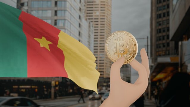 Golden bitcoin held by a hand with a waving Cameroon flag in the background against a modern urban cityscape - Powered by Adobe