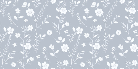 Obraz premium Vector floral seamless pattern. Subtle minimal ditsy background with small wild meadow flowers, leaves, branches. Gray and white pretty floral ornament texture. Abstract elegant cute repeating design