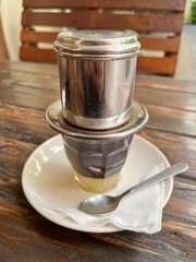 Vietnamese drip coffee is dripping