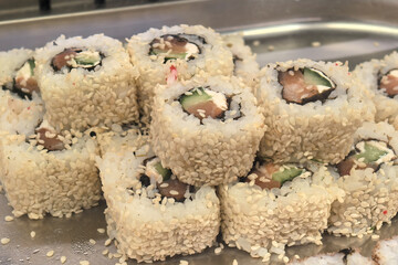 Delicious sushi rolls featuring fresh ingredients and artistic presentation