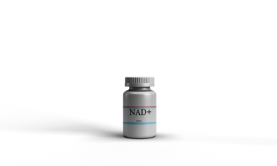 NAD+ bottle drip vitamin medical healthcare research science treatment chemistry disease caduceus white dicut background NAD laboratory biochemistry technology metabolism object exam medical NAD+ dna