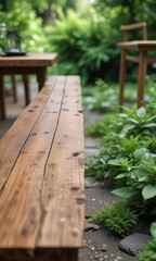 Fototapeta premium Close-up of wooden table legs surrounded by blurred green foliage, wooden, legs, blurred
