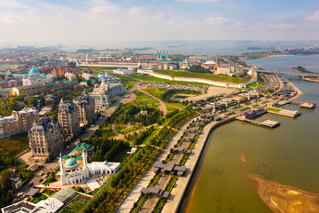 Aerial view of historical districts of Kazan on bank of Volga River overlooking ancient Kremlin on sunny summer day, Republic of Tatarstan, Russia.