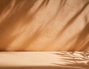 An empty table set against a beige textured wall, with soft leaf shadows cast across the surface. 