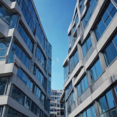 Fototapeta premium Office building with windows on a clear blue sky, office space, architecture