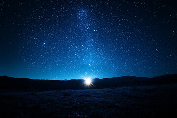 Fototapeta premium A Star Glowing Intensely Against a Pitch-Black Sky, Adding a Sense of Wonder and Mystery to the Night