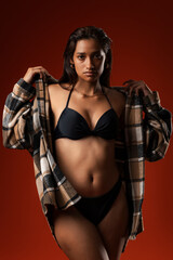 Photo of young Hispanic woman with sensual body 