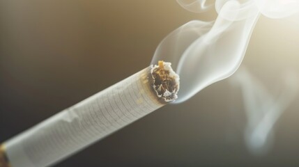 a cigarette that is burned and emits smoke