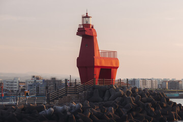 Iho Tewoo Horse Lighthouses on Iho Tewoo beach, with two horse-shaped lighthouses, white horse...