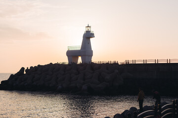 Iho Tewoo Horse Lighthouses on Iho Tewoo beach, with two horse-shaped lighthouses, white horse...