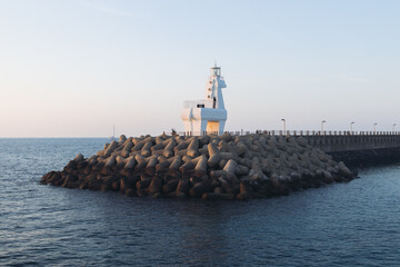 Iho Tewoo Horse Lighthouses on Iho Tewoo beach, with two horse-shaped lighthouses, white horse...