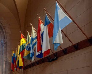 South American flags in a row one beside the other in their masts