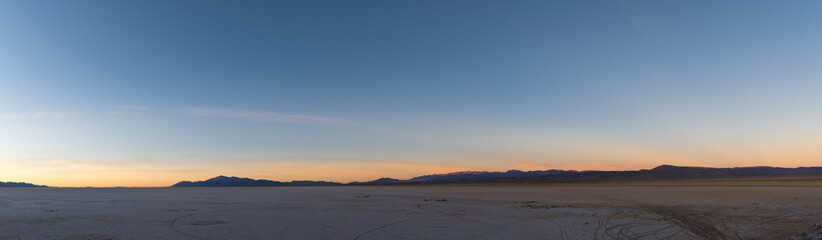 beautiful sunset with a panoramic view in salinas grandes, salt flat in the andean altiplano Jujuy, Argentina