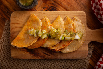 Tacos de Canasta, "basket tacos" also known as Tacos Sudados, are a typical fast food from Mexico. They are made with corn tortillas and can be filled with potatoes, beans, mole, adobo or pork rinds.