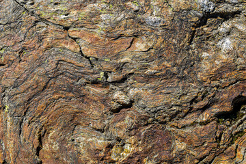 natural patterns of layers in granite rock, background