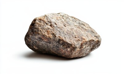 Fototapeta premium Single, rough, gray-brown rock isolated on white background.