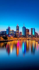 Naklejka premium Serene skyline at night, bold fireworks in shades of blue, red, and gold reflecting softly in a calm river below