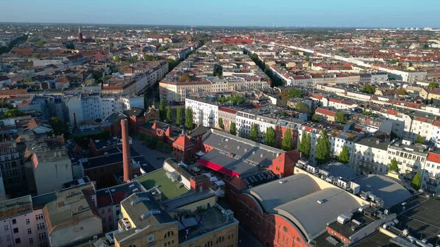 Berlin's urban landscape, capturing a mix of residential and commercial buildings, streets, and green spaces. Best aerial view flight speed ramp hyper motion time lapse