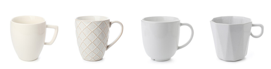 Set of ceramic cups on white background