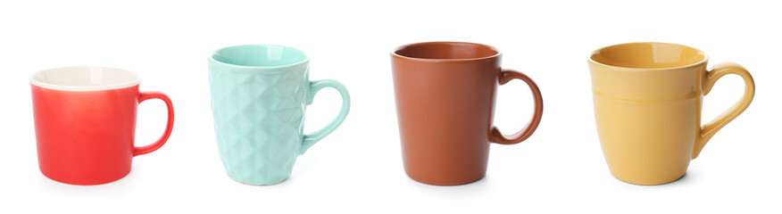 Set of ceramic cups on white background