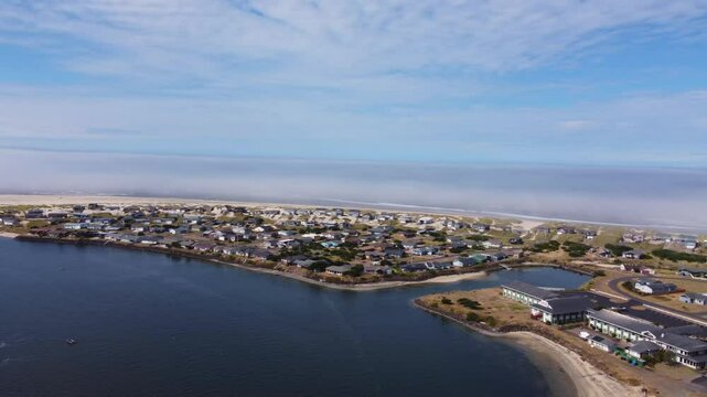 Low Coastal Sea Fog, BayShore Point, Alsea River, Waldport, OR, Oregon, along Highway 101. Summer Day Panorama of Bayshore Peninsula. Beachfront Oceanfront Community Development