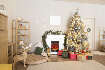 Interior of living room with fireplace, Christmas tree and gifts