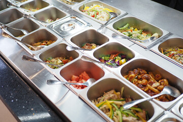 Buffet with variety of dishes in a dining area