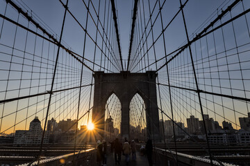 brooklyn bridge at sunrise (new york city landmark over east river to manhattan) travel tourism...
