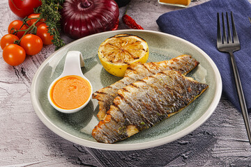 Grilled seabass fillet with lemon