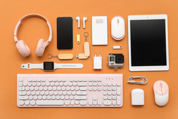 Composition with various modern devices on color background