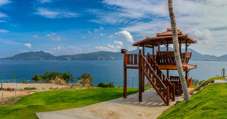 Patong Beach phuket Thailand beautiful turquoise blue waters on the white sand and long tail boats used for tourist 