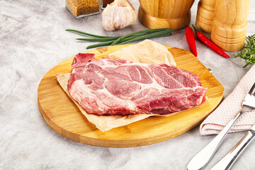 Raw pork neck steak for grill